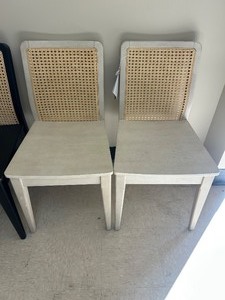 lot 102 image: Safavieh Benicio Rattan Dining Chairs (Set of 2) - MSRP $360