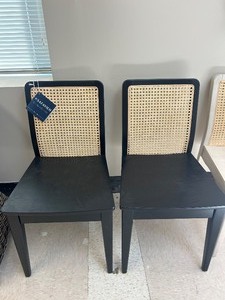 lot 103 image: Safavieh Benicio Rattan Dining Chairs (Set of 2) - MSRP $360