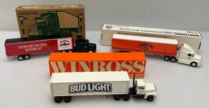 lot 112 image: Misc. Ertl Miniature Die-Cast Semi Trucks (Most With Advertising) NIB