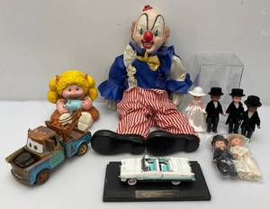 lot 151 image: Misc. Vintage Toys Including Cabbage Patch Vinyl Bank And More