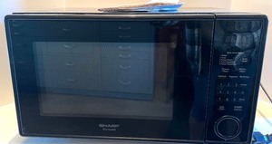 lot 164 image: Sharp Carousel Microwave Oven R-309Y with Operation Manual