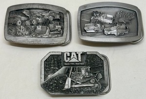 lot 15 image: Set of 3 CAT Collectible Pewter Belt Buckles by Norscot Group