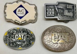 lot 16 image: Set of 4 CAT and Allis-Chalmers Collectible Belt Buckles