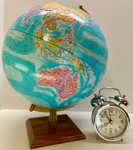lot 66 image: Vintage World Globe on Wooden Stand and Sterling & Noble Alarm Clock