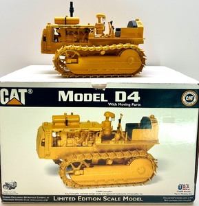 lot 74 image: CAT Model D4 Limited Edition Scale Model Tractor with Moving Parts