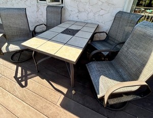 lot 99 image: Outdoor Tile-Top Patio Table with 4 Swivel Mesh Chairs