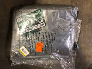 lot 64 image: Everbilt 10 ft. x 20 ft. Silver Heavy Duty Canopy Tarp  Customer Returns See Pictures