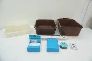 lot 203 image: Wash Tubs, Tupperware Containers wlids, Aluminum Foil, Freezer Packs