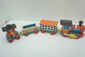 lot 216 image: Vintage Fisher Price Wooden Huffy Puffy Toy Train 4 pieces.
