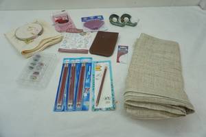 lot 256 image: Sewing Supplies and Embroidery Pattern Tablecloth
