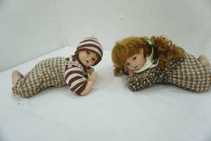 lot 27 image: Vintage Porcelain Baby 12 long by 6.5tall