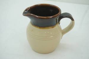 lot 321 image: Antique Stoneware Pitcher 6 tall 4 diameter