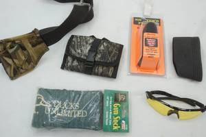 lot 553 image: Recoil Pads, Ammo PouchesBelt, Gun Sock, Safety Glasses