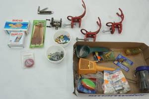 lot 556 image: Bait, Tackle, Metal Rod Holders (3ct), Band-Aids, Vintage Fishing Reel