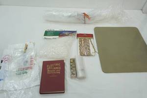 lot 569 image: Electric Appliance Repair & Servicing Book, Foam Mat, Plastic, Christmas Lights Clips