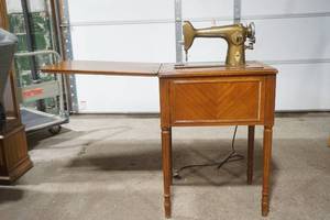 lot 637 image: Antique Free-Westinghouse Sewing Machine and Cabinet