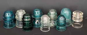 lot 70 image: LL - Collection of 9 Vintage Glass Insulators Assorted Colors and Styles