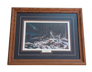 lot 152 image: LL - Framed Jim Hansel Night Lights Wolf Print
