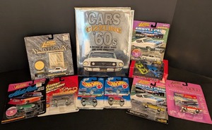 lot 153 image: LL - Collection of Die-Cast Model Cars with 1960s Cars Hardcover Book