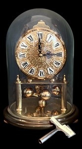 lot 126H image: FLR - Vintage Gold Tone Anniversary Mantel Clock with Glass Dome and Key, 7 Inches Tall