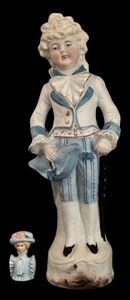 lot 195H image: FLR - Vintage Bisque Porcelain Doll and Avon 1982 Bust Figurine Set