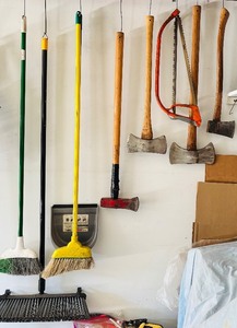 lot 199H image: G - Collection of Outdoor Tools Including Axes, Saws, Brooms, and Brushes