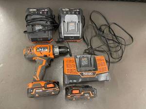lot 3 image: Ridgid 18V Cordless Drill with Batteries and Chargers