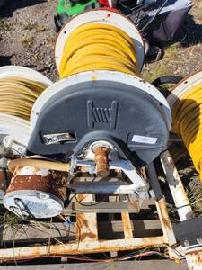 lot 10 image: Hannay Electric Hose Reel with Yellow Hose and Permanent Magnet Motor