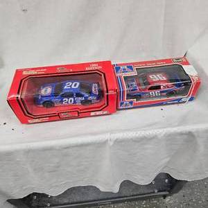 lot 36 image: 124 Big A Auto Parts and Fina Nascars
