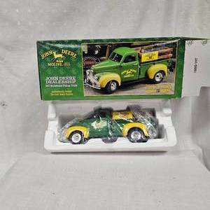 lot 67 image: 124 John Deere Dealership 1947 Studebaker