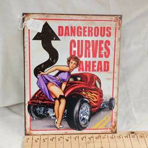 lot 113 image: 16x12 Dangerous Curves Metal Sign