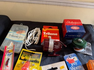 lot 115 image: Vintage Shakespeare Reels & Spinners