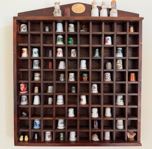 lot 30 image: Fun Thimble Collection in a Wooden Cabinet
