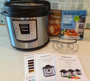 lot 51 image: Instant Pot With Manuals & Recipes