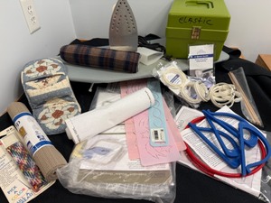 lot 65 image: Quilting Supplies--Turntable, Rulers, Small Ironing Board & Iron