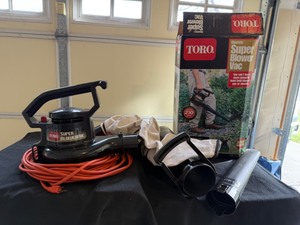 lot 74 image: Toro Electric Super Blower Vac Model 51587 With Extension Cord
