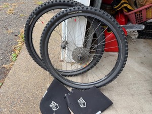 lot 22 image: Nokian 26x2.1 Studded Tires & Winter Mitts