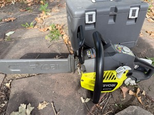 lot 28 image: Ryobi Gas Powered Chain Saw KY3716 with Toolkit