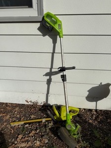 lot 61 image: Sun Joe Hedge Trimmer & Greenworks Weed Trimmer
