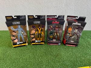 lot 16 image: Marvel Legends Iceman, Kitty Pryde, Iron Man Mark 43 & Warriors of the Web