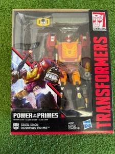 lot 75 image: Transformers Power of the Primes Leader Class Rodimus Prime