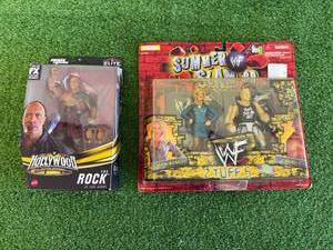 lot 163 image: The Rock & WWF Summer Slam 99 Figures