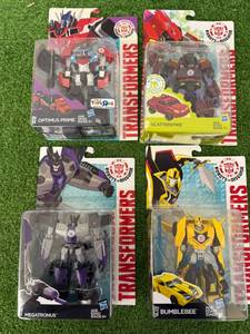 lot 233 image: Transformers Optimus Prime, Megatronus, Scatterspike & Bumblebee