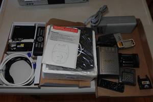 lot 435 image: Assorted Electronics - Battery Chargers, Remotes