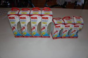 lot 548 image: 7 Nuk Bottles