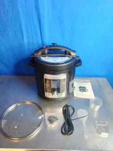 lot 24 image: MegaChef 6-Quart Stainless Steel Electric Digital Pressure Cooker.