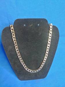 lot 17 image: Stainless Steel and 18k Gold Plated Diamond Cut Necklace