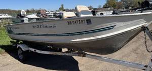 lot 2 image: 1999 Northwoods 1675 DLX Fisherman 16 Tiller 40hp 2 stroke and Northwoods Trailer.