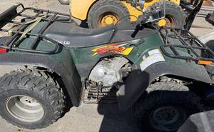 lot 16 image: 1999 Arctic Cat Bearcat 454 4-wheeler.  Ran through shop upon trade in.