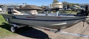 1994 Tracker Guide V16 16’ tiller with 2008 Mercury 25hp 4 stroke and Shorelander bunk trailer.  It has 3 seats, trolling motor, and depth finder.